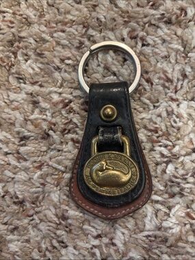 Dooney & Bourke Black and Brown Leather Key Fob with Brass Duck Emblem